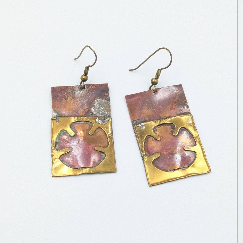 Artisan hand crafted metal flower dangle earrings